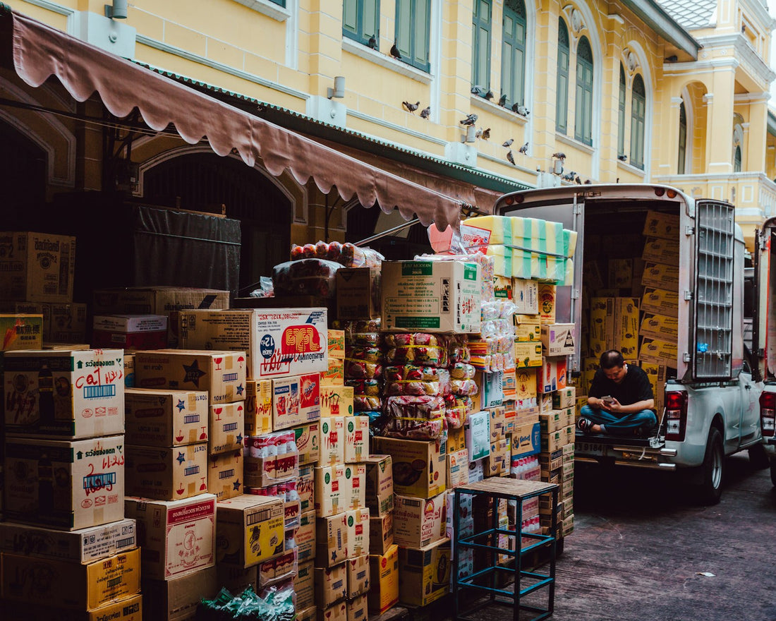 Assorted boxes staged for loading, representing in-bond freight moving to a sufferance warehouse