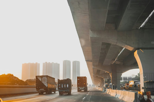 Freight trucks on a highway corridor